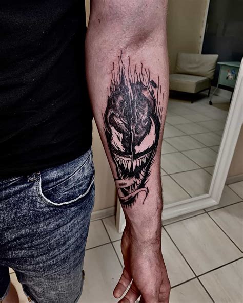 venom tattoo